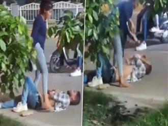 Bắt quả tang chồng đưa một cô gái khác đến dự tiệc ở khách sạn, vợ đánh chồng tới tấp giữa phố